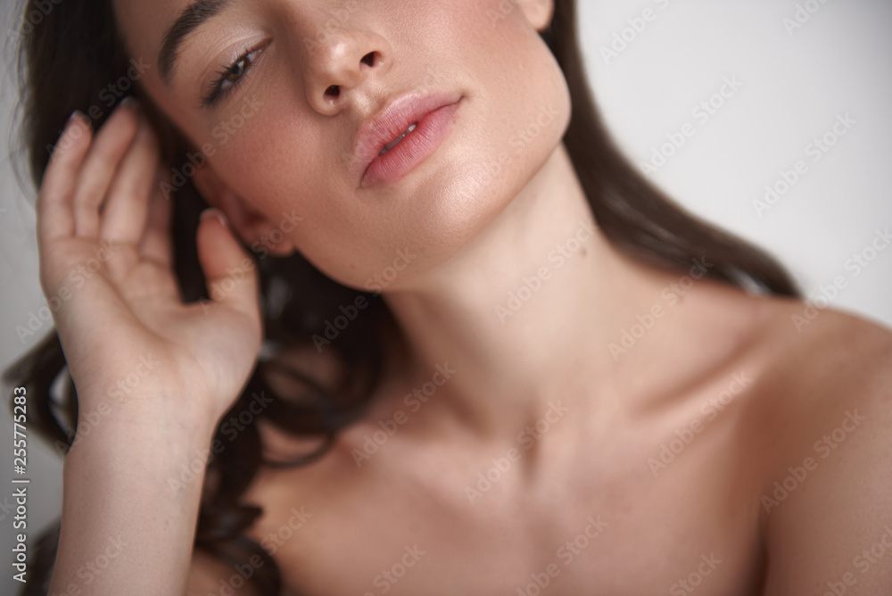 Fashion portrait of sexy brunette woman on white Fashion portrait of sexy brunette woman on white