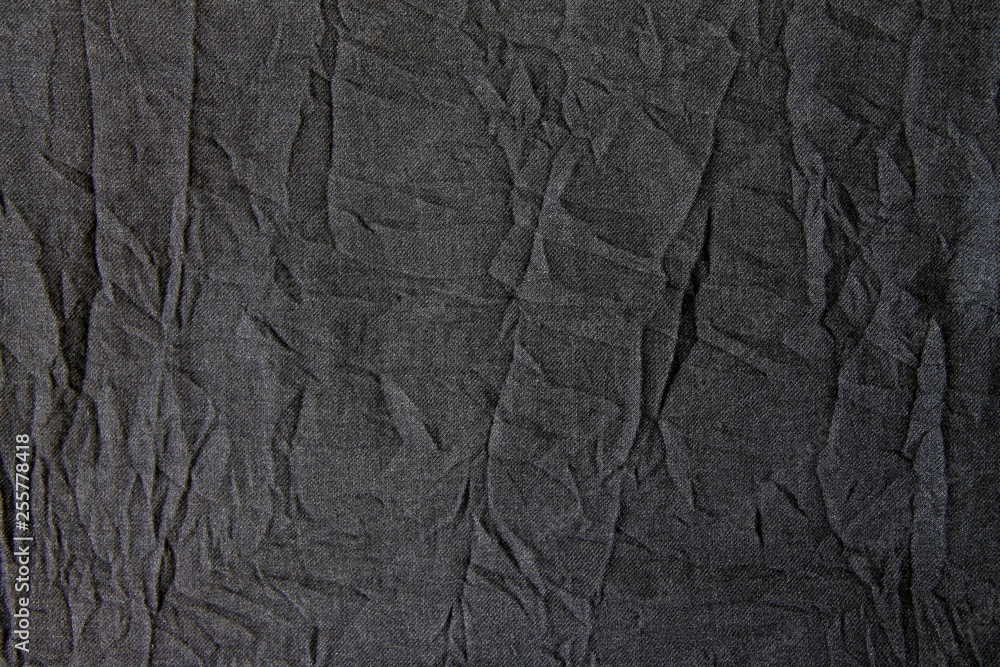 gray wrinkled and pleated fabric can be used as background gray wrinkled and pleated fabric can be used as background