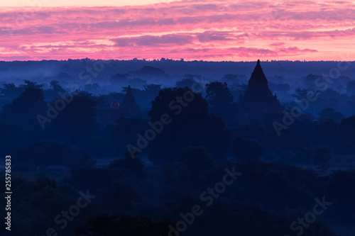 View of ancient temples in foggy morning, sunrise in Bagan, Myanmar (Burma)