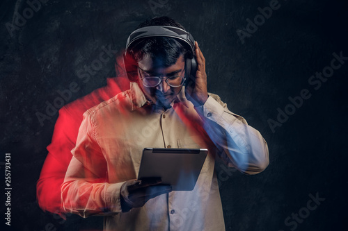 Indian man in wireless head...