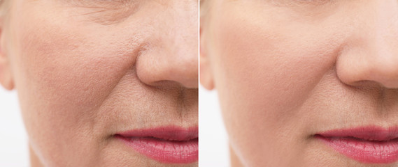Closeup view of beautiful older woman on white background