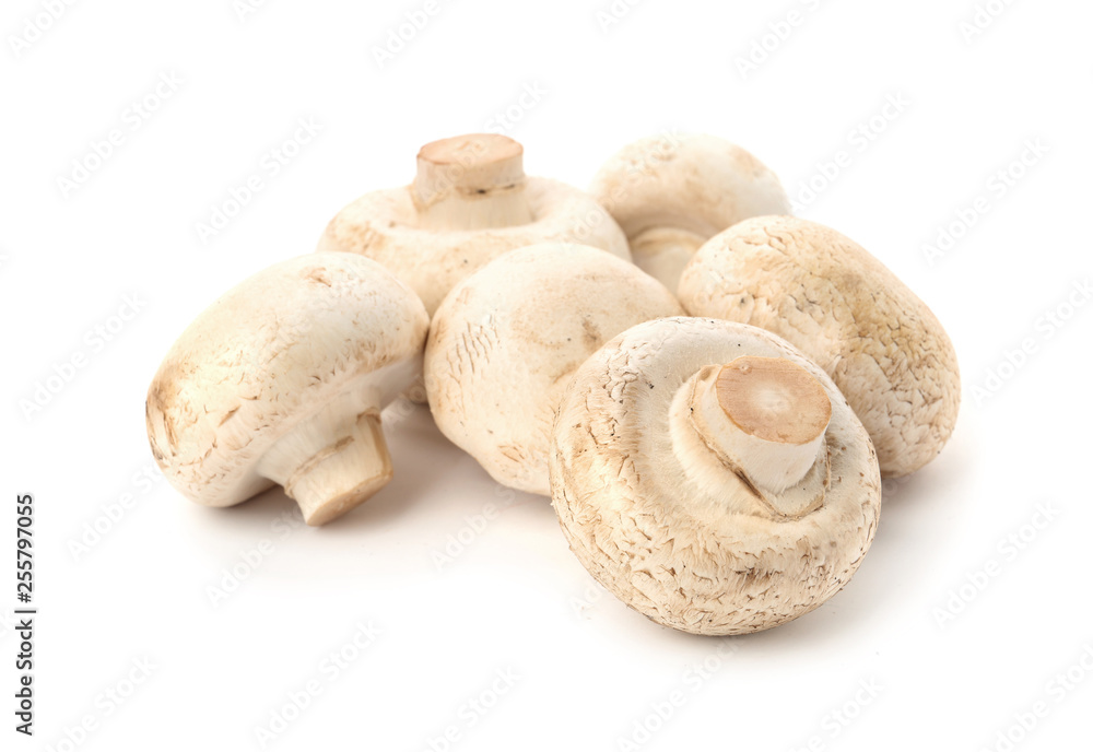 Fresh raw champignon mushrooms on white background Fresh raw champignon mushrooms on white background