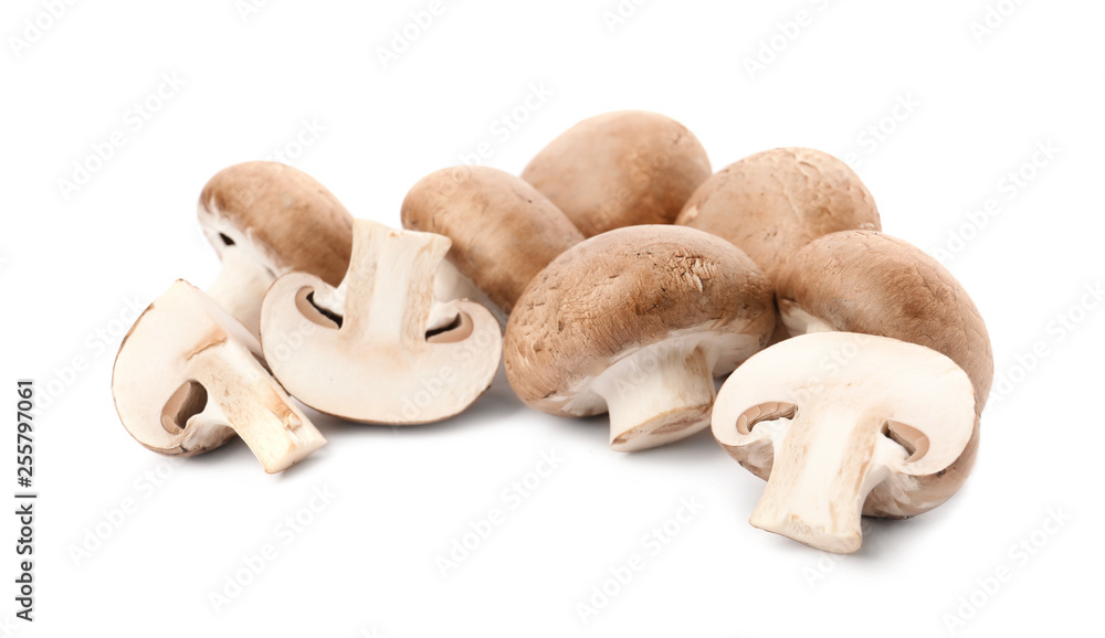 Fresh raw champignon mushrooms on white background Fresh raw champignon mushrooms on white background