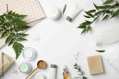 Flat lay composition with different body care products and space for text on white background