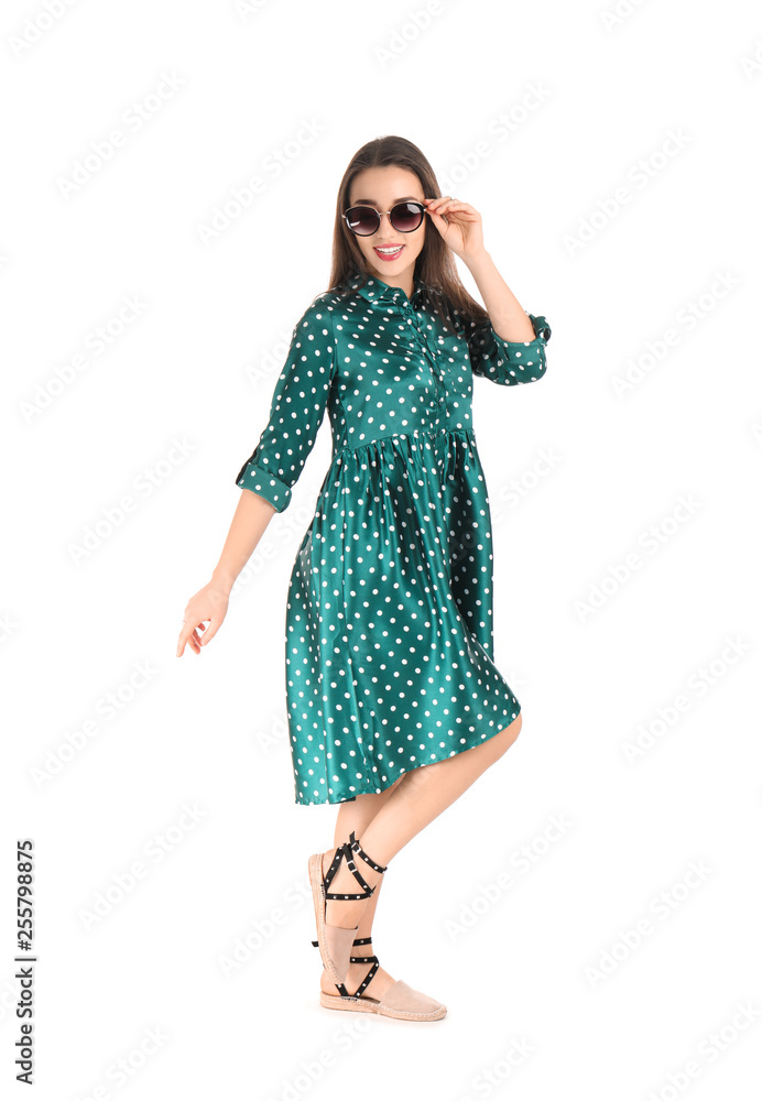 Portrait of beautiful young woman in stylish dress on white background Portrait of beautiful young woman in stylish dress on white background