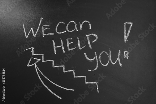 Drawing of stairs and phrase WE CAN HELP YOU on chalkboard