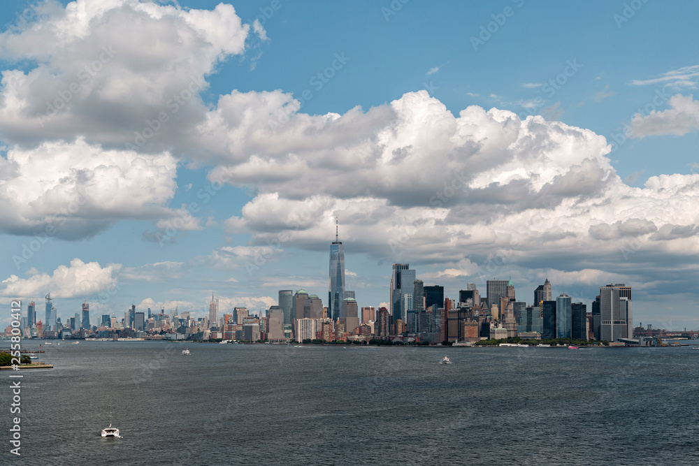 New York City / USA - AUG 22 2018: Lower Manhattan skyscrapers and buildings view from the Statue of Liberty New York City / USA - AUG 22 2018: Lower Manhattan skyscrapers and buildings view from the Statue of Liberty