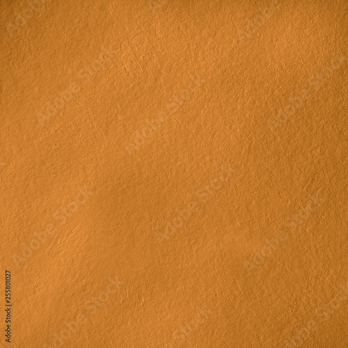 Texture natural stone golden color. Background natural relief stone. Square size.