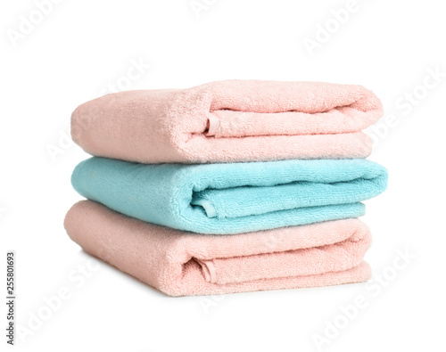 Folded soft terry towels on white background