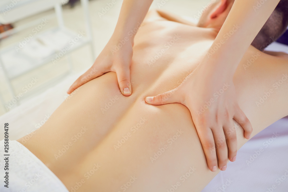 Fototapeta premium Man getting massage in the spa salon. .