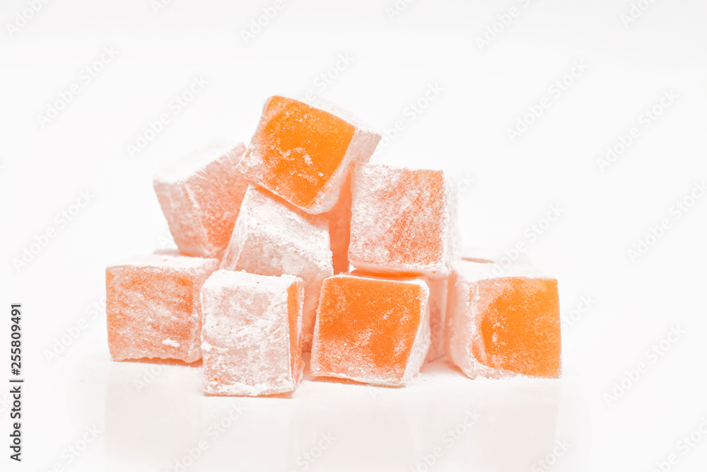 Turkish orange delight on white background. Turkish orange delight on white background.