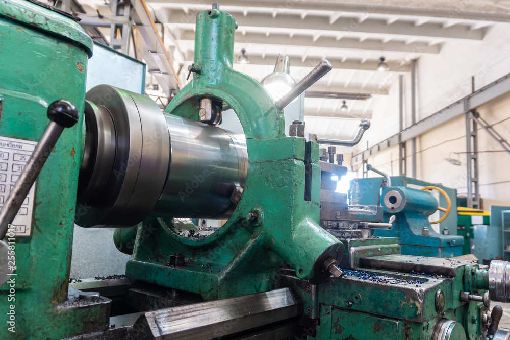 Lathe, manufacturing parts by machining metal on a milling machine. Lathe, manufacturing parts by machining metal on a milling machine.