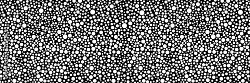 Contemporary screensaver with elements of geometry. Wide-screen background with randomly scattered circles for a bold and catchy decision in style or a new trend. Seamless pattern if vertical. 