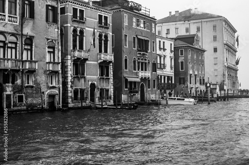 Venice / Italy 19 february 2019 :Snapshot of the houses by the canal,photo taken from vaporetto the traditional transportation of venice for the public