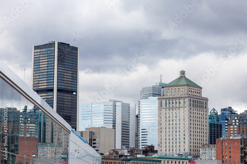 Montreal skyline, with the iconic buildings of the old Montreal (Vieux Montreal) and the CBD business skyscrapers taken from the port. Montreal is the main city of Quebec, and the 2nd city in Canada