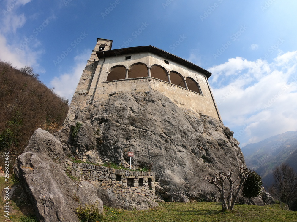 Fototapeta premium The shrine of St. Patrick (San Patrizio), Colzate, Bergamo, Italy. A perched medieval site
