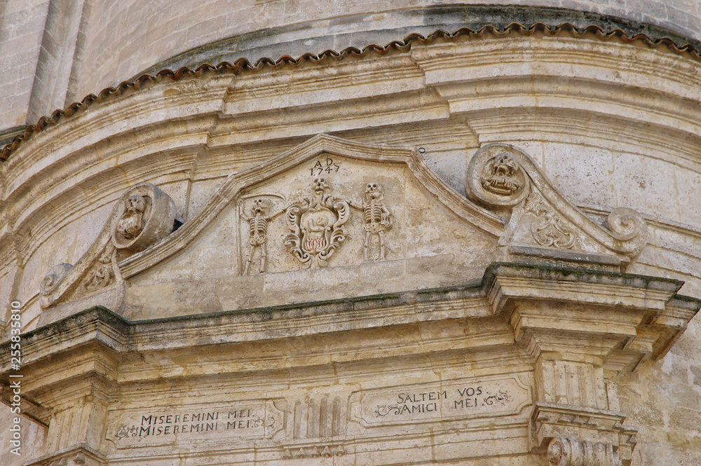 A baroque facade over the door one of the churches in the historial center of Matera town, Basilicata, Italy. UNESCO World Heritage Site. European capital of culture 2019 A baroque facade over the door one of the churches in the historial center of Matera town, Basilicata, Italy. UNESCO World Heritage Site. European capital of culture 2019