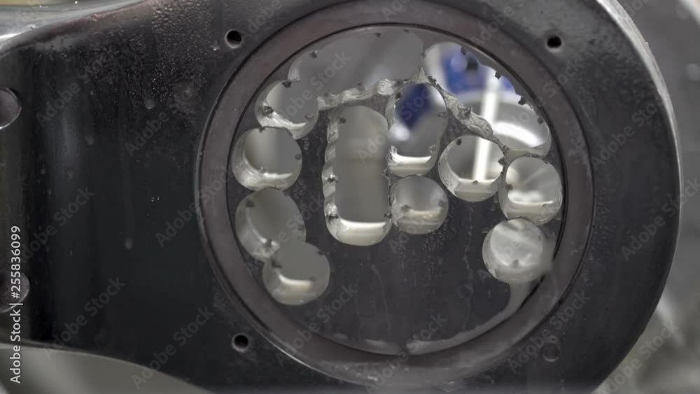 View at carving process in dental milling machine View at carving process in dental milling machine