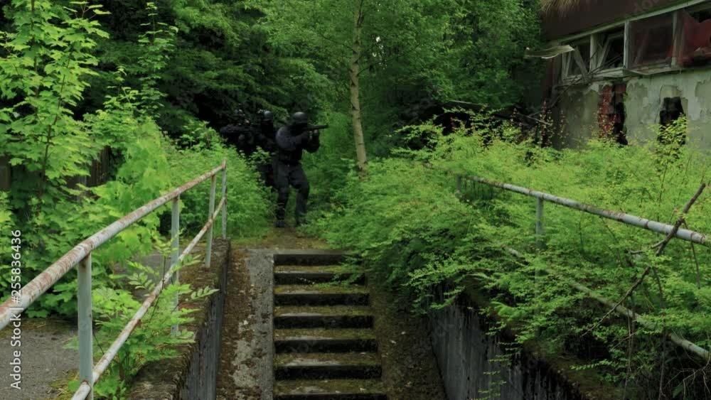 A Specail Force Squad walk outside in a wilderness area downstairs. A Specail Force Squad walk outside in a wilderness area downstairs.