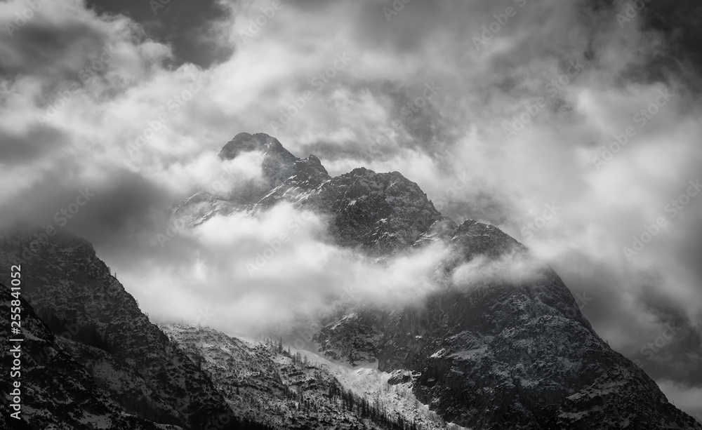 Clouds on the Cristallo mountain (Italian dolomites) in winter