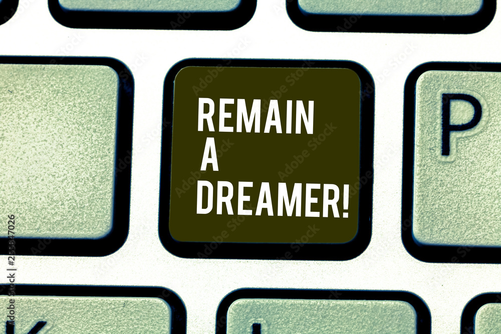 Word writing text Remain A Dreamer. Business photo showcasing they spend lot of time thinking about and planning things Keyboard key Intention to create computer message pressing keypad idea Word writing text Remain A Dreamer. Business photo showcasing they spend lot of time thinking about and planning things Keyboard key Intention to create computer message pressing keypad idea