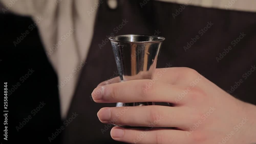 The process of preparing an alcoholic cocktail at the bar. The process of preparing an alcoholic cocktail at the bar.