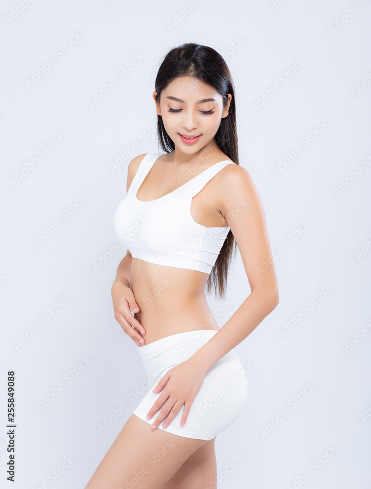 Obraz premium Portrait young asian woman smiling beautiful body diet with fit isolated on white background, model girl weight slim with cellulite or calories, health and wellness concept.