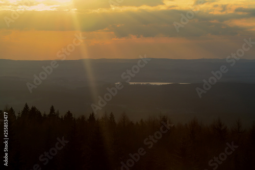 big sunset view over the forest in bavaria