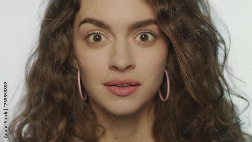 Surprised woman face. Close up of surprised girl face. Model wow expression Surprised woman face. Close up of surprised girl face. Model wow expression