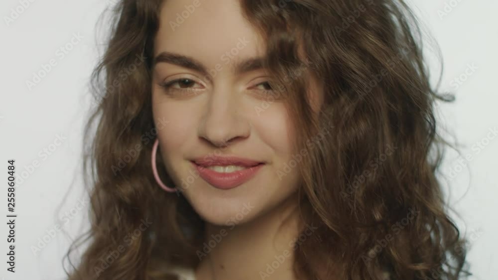 Happy woman sending air kiss to camera. Smiling girl face send air kiss Happy woman sending air kiss to camera. Smiling girl face send air kiss