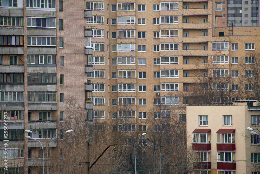 windows of apartment buildings in a residential area of the city, where every tenant has his own privacy