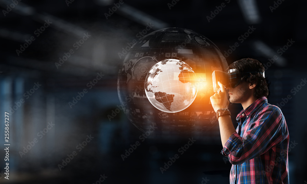 Fototapeta premium Experiencing virtual technology world. Mixed media