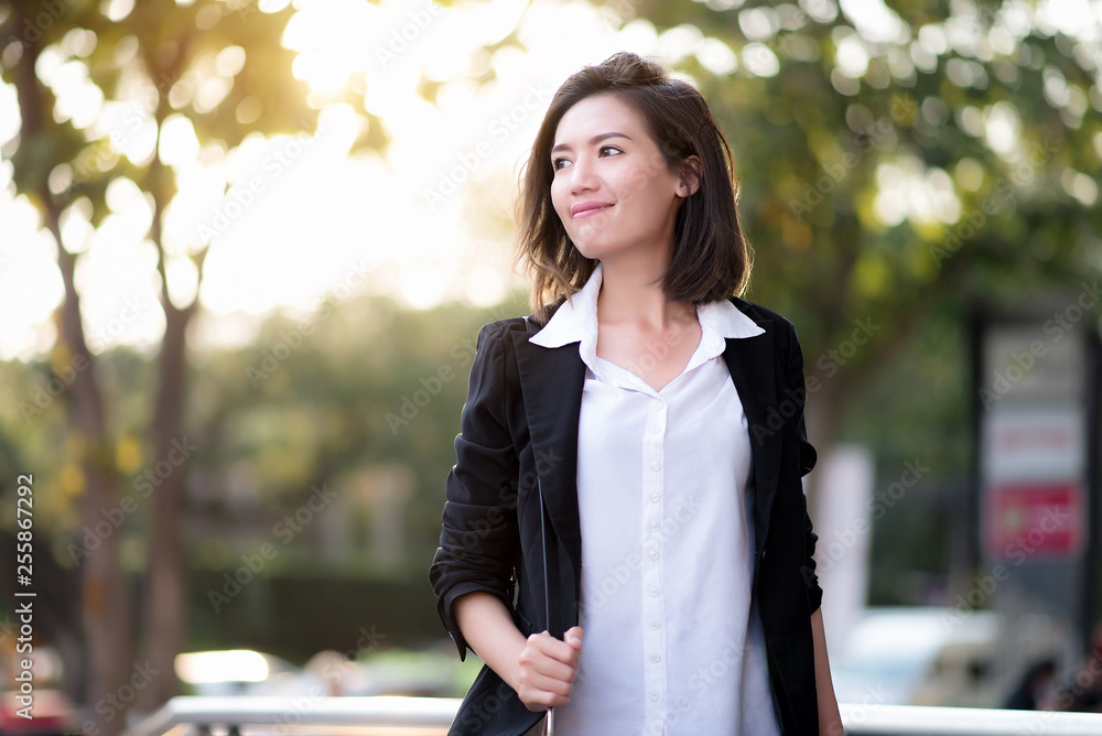 Asian woman smiling in outdoor.business concept. Asian woman smiling in outdoor.business concept.