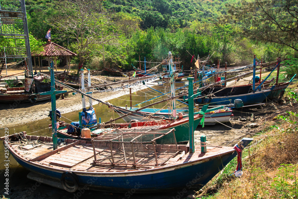 Thai small fishing boats have docked at fishing village
