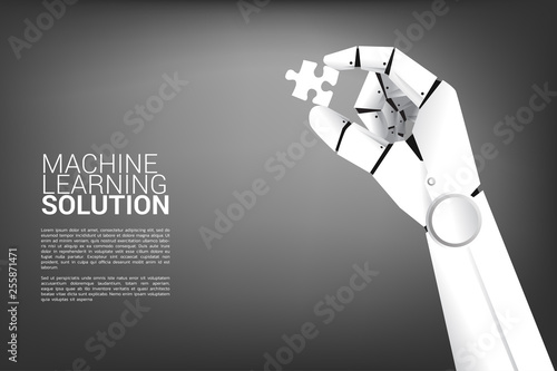 Robot hand hold jigsaw. Business concept for machine learning and a.i artificial intelligence