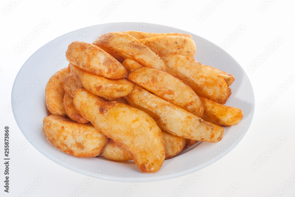 White plate with fried chicken rolls White plate with fried chicken rolls