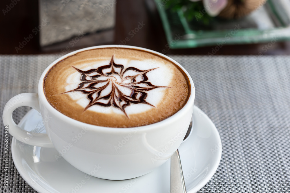 Close shots, hot coffee in a white cup Close shots, hot coffee in a white cup