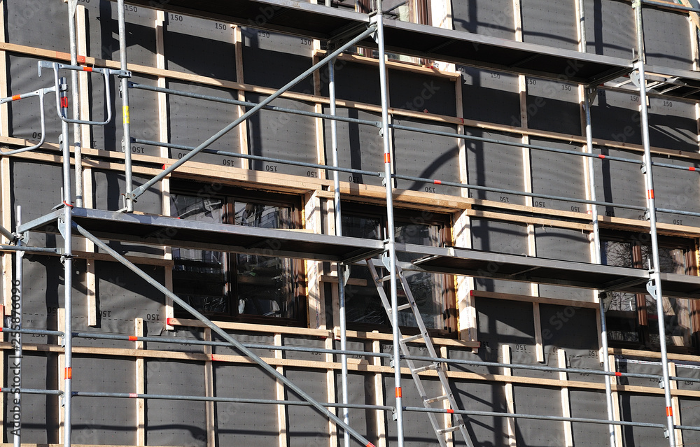 scaffold at house prepared for thermal insulation