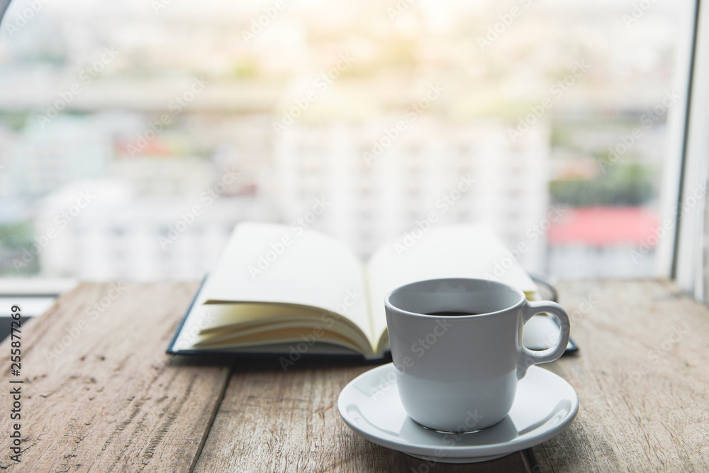Notebook with coffee cup Notebook with coffee cup