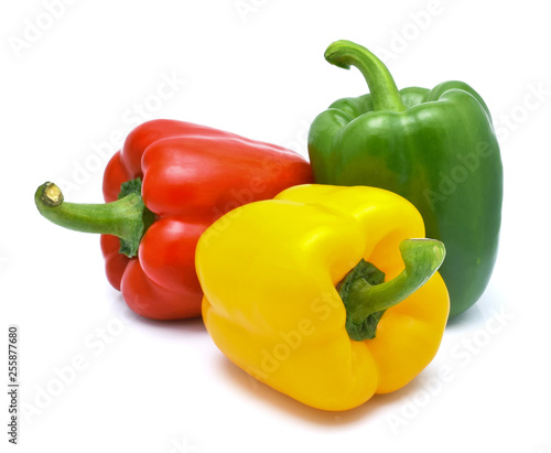Red, yellow, green fresh and healthy peppers on white background