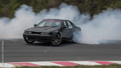 Car drifting with smoke, motion blur drifting car.