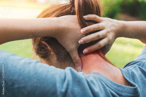 Fotografie Young woman asian have accident Neck pain in sport exercise jogging, Health and