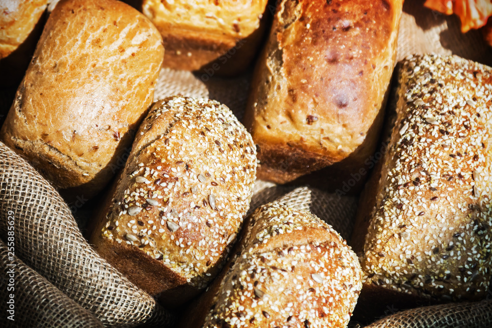freshly baked bread with a delicious crust of seeds, flax and sesame seeds 