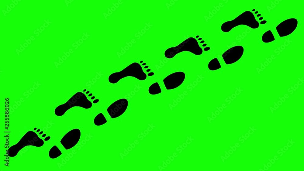 A mixed track of black footprints made by one shoe and one naked foot, appearing on a green background. A mixed track of black footprints made by one shoe and one naked foot, appearing on a green background.
