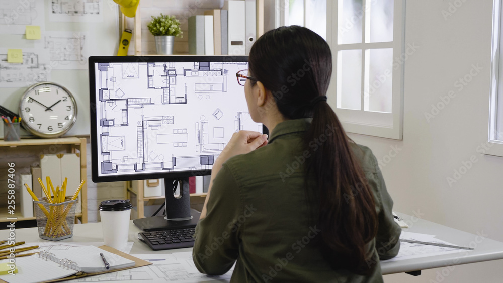 asian woman interior designer looking floor plan of new house indoor design on monitor concentrated thinking idea. Blueprint architect construction project sketch concept on laptop computer screen. asian woman interior designer looking floor plan of new house indoor design on monitor concentrated thinking idea. Blueprint architect construction project sketch concept on laptop computer screen.