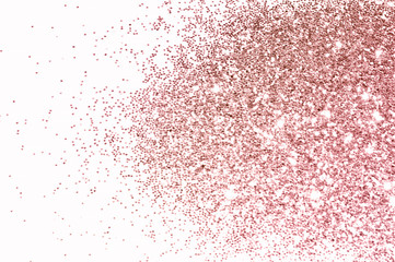 Rose gold glitter on white background