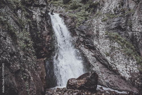 Closeup view of waterfall scenes in mountains  national park Dombay  Caucasus