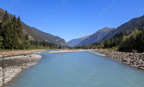 Panorama view of river scene in mountains of national park Dombay, Caucasus