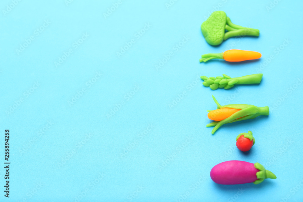 Plasticine vegetables for healthy diet. Carrots, asparagus, tomato, corn, eggplant and broccoli. Antioxidants, organic foods.