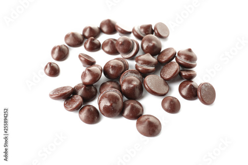 Delicious chocolate chips on white background